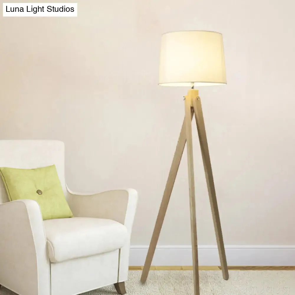 Minimalist Beige Tri-Leg Floor Lamp with Tapered Drum Shade - 1-Light Standing Light Fixture