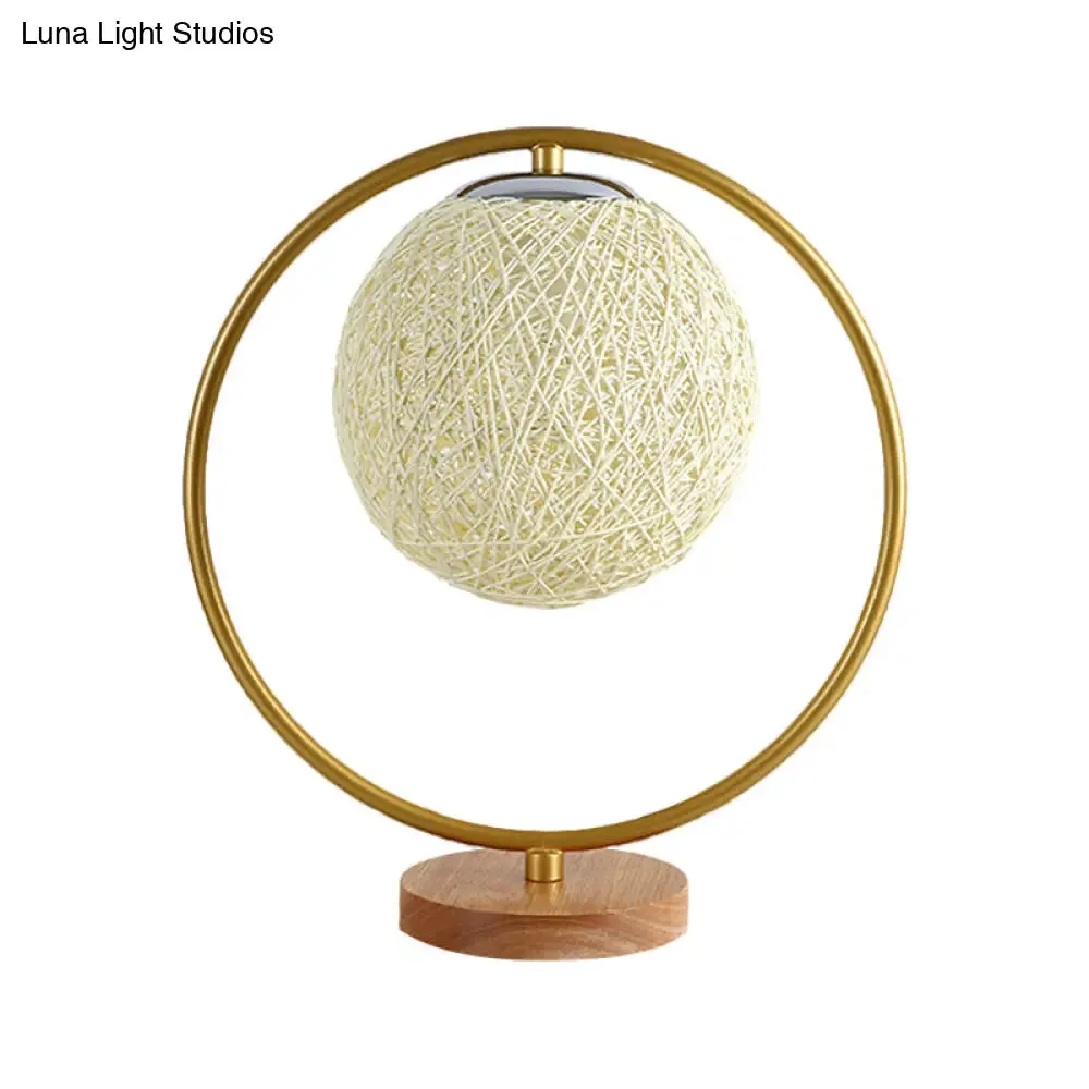 Minimalist Beige/Red Sphere Desk Lamp with Single Fabric Head and Round Frame Design