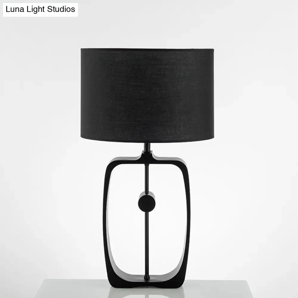 Minimalist Black Fabric Table Lamp with Round Shape and Open Base