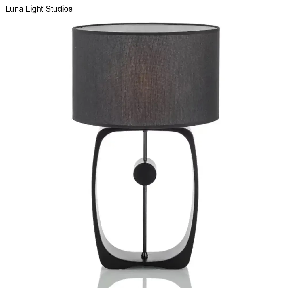 Minimalist Black Fabric Table Lamp with Round Shape and Open Base