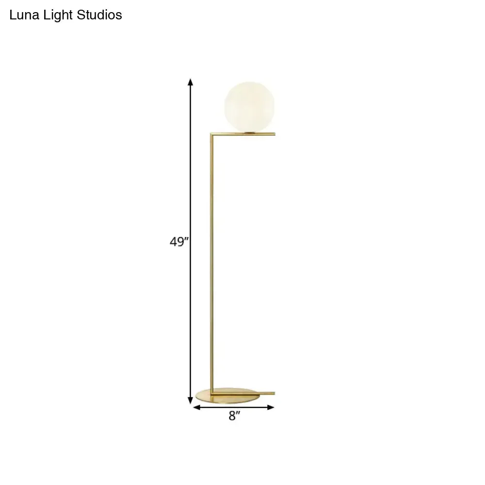 Minimalist Gold Orb Floor Lamp with Frosted Glass Shade and Right Angle Stand